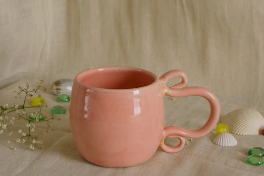 Bubble pink mug with curly handle